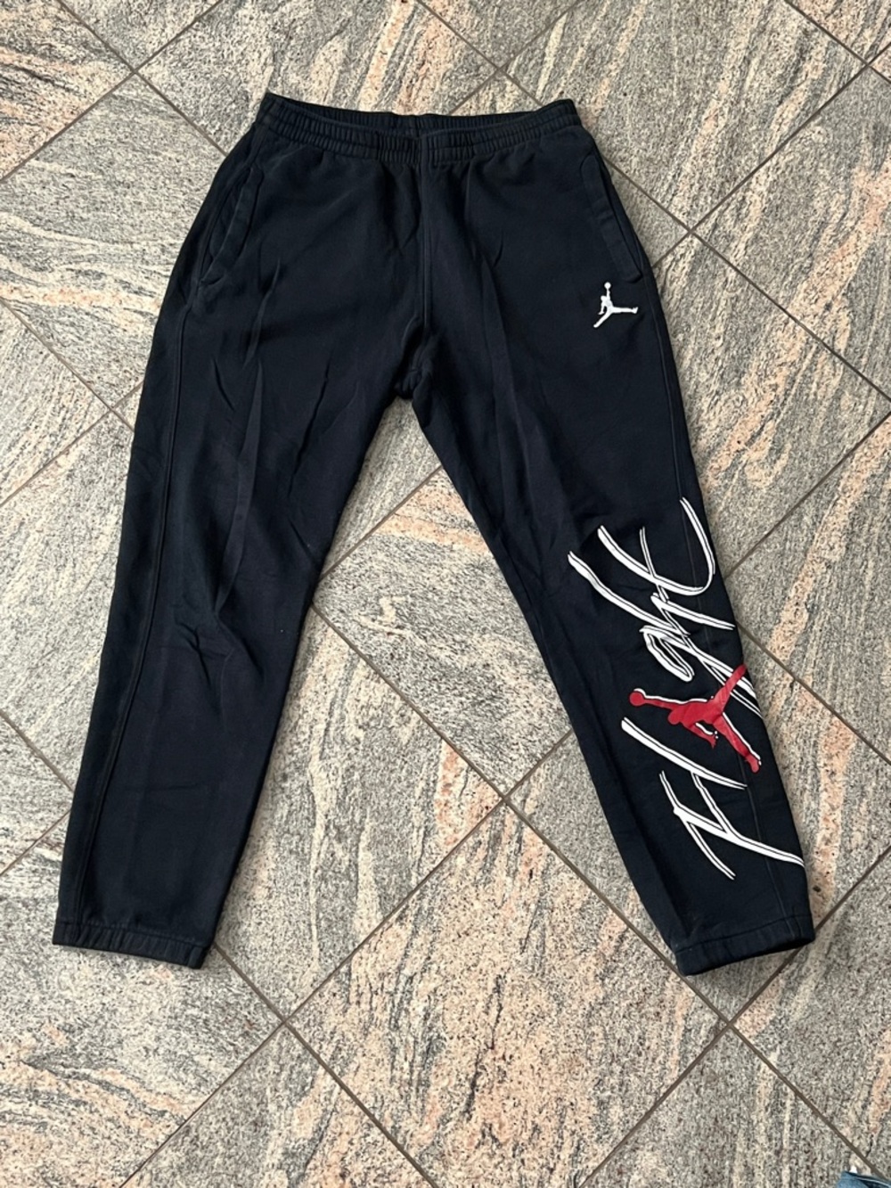Jordan Gorpcore  
Athlesasure  Black Sweatpants with Red & White Jumpman Graphic